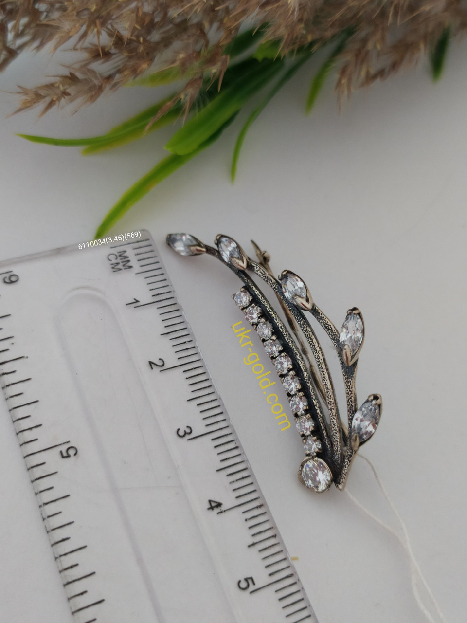 Срібна брошка 925 проби з цирконієм