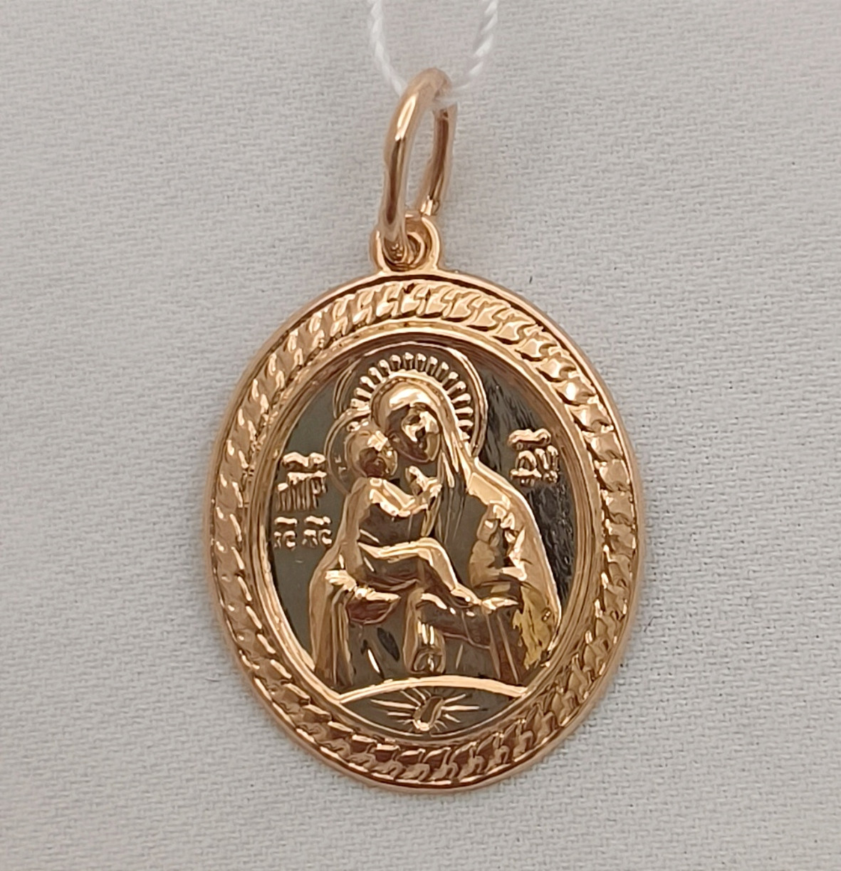 Маленька золота іконка в червоному золоті 585 проби