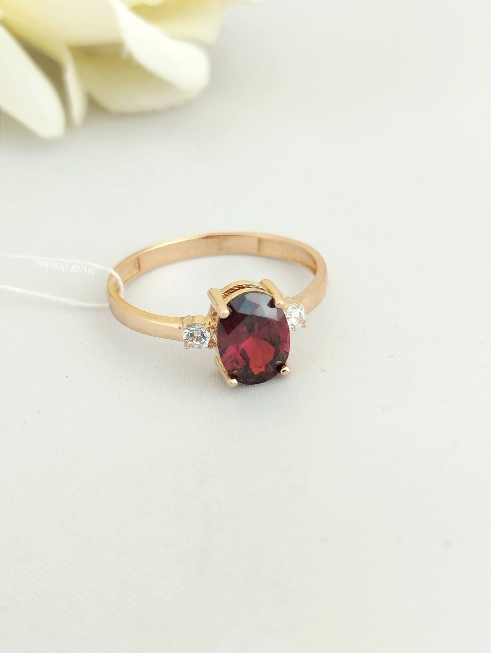Золоте кільце з гранатом і цирконієм