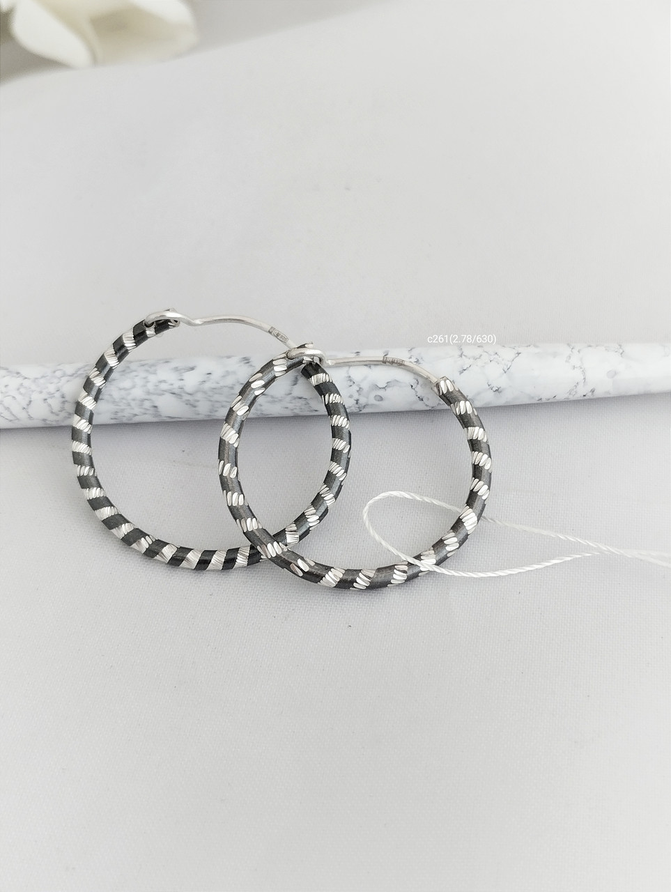 Срібні сережки кільця