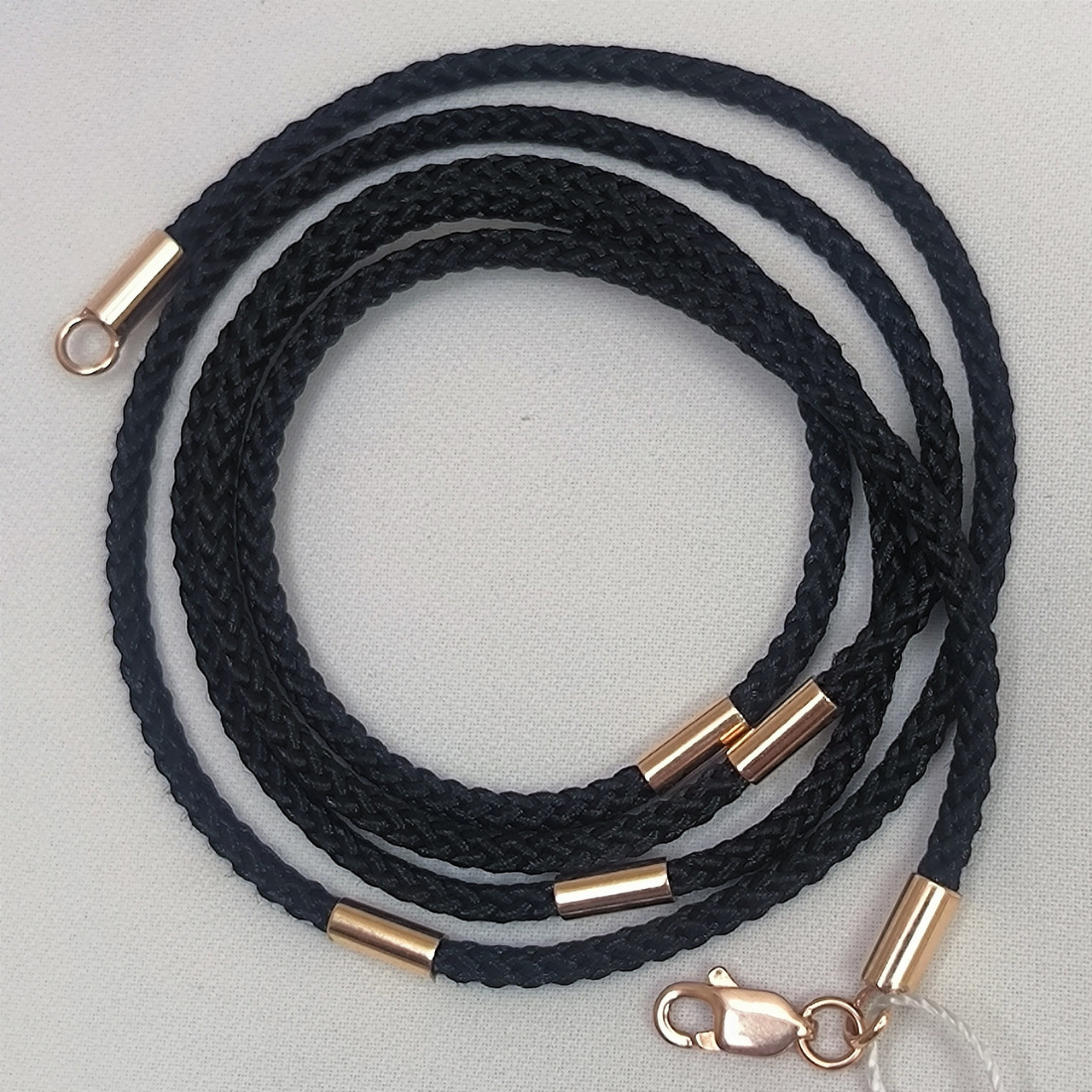 Тканинний шнурок зі вставками з червоного золота 585 проби