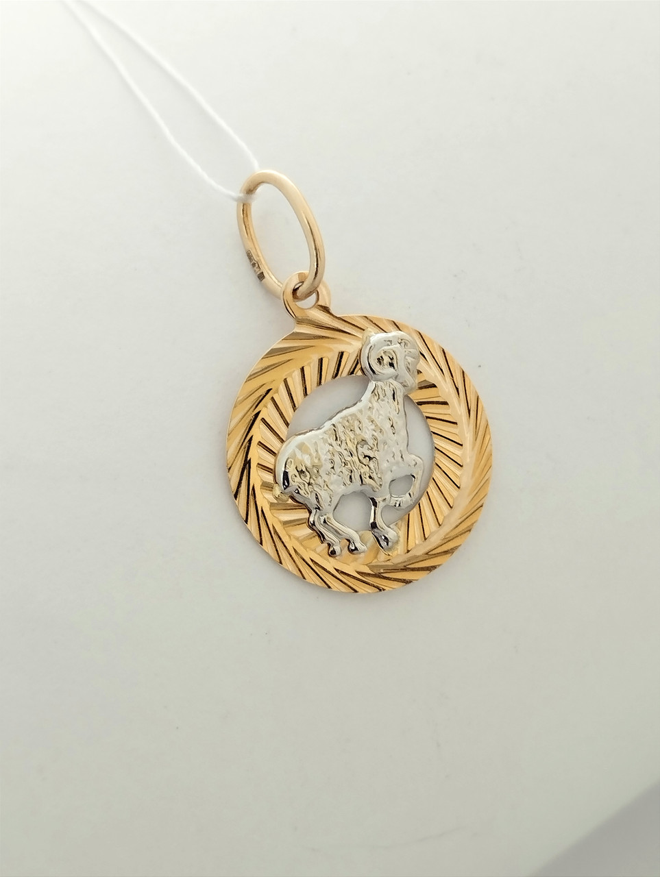 Золотий кулон