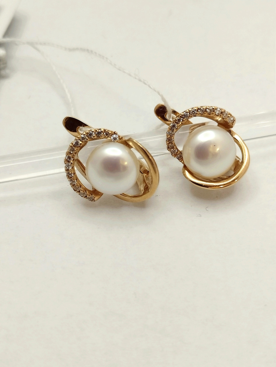 Золоті сережки з перлами