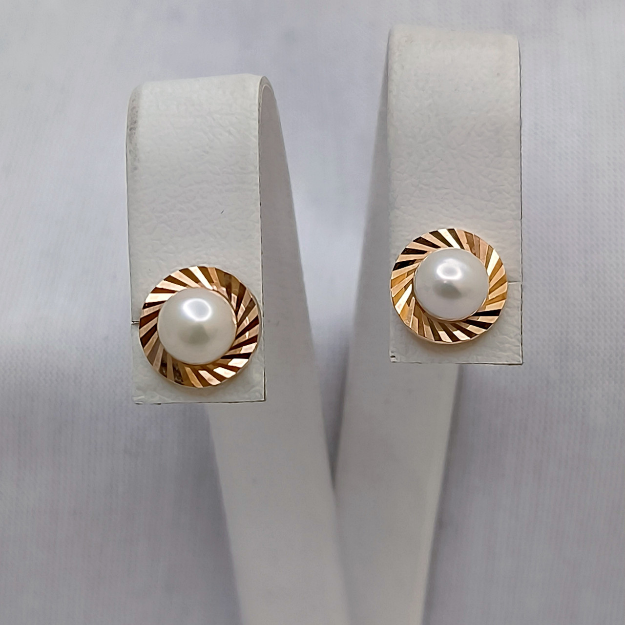 Золоті сережки гвіздочки в червоному золоті 585 проби з вставкою перлини