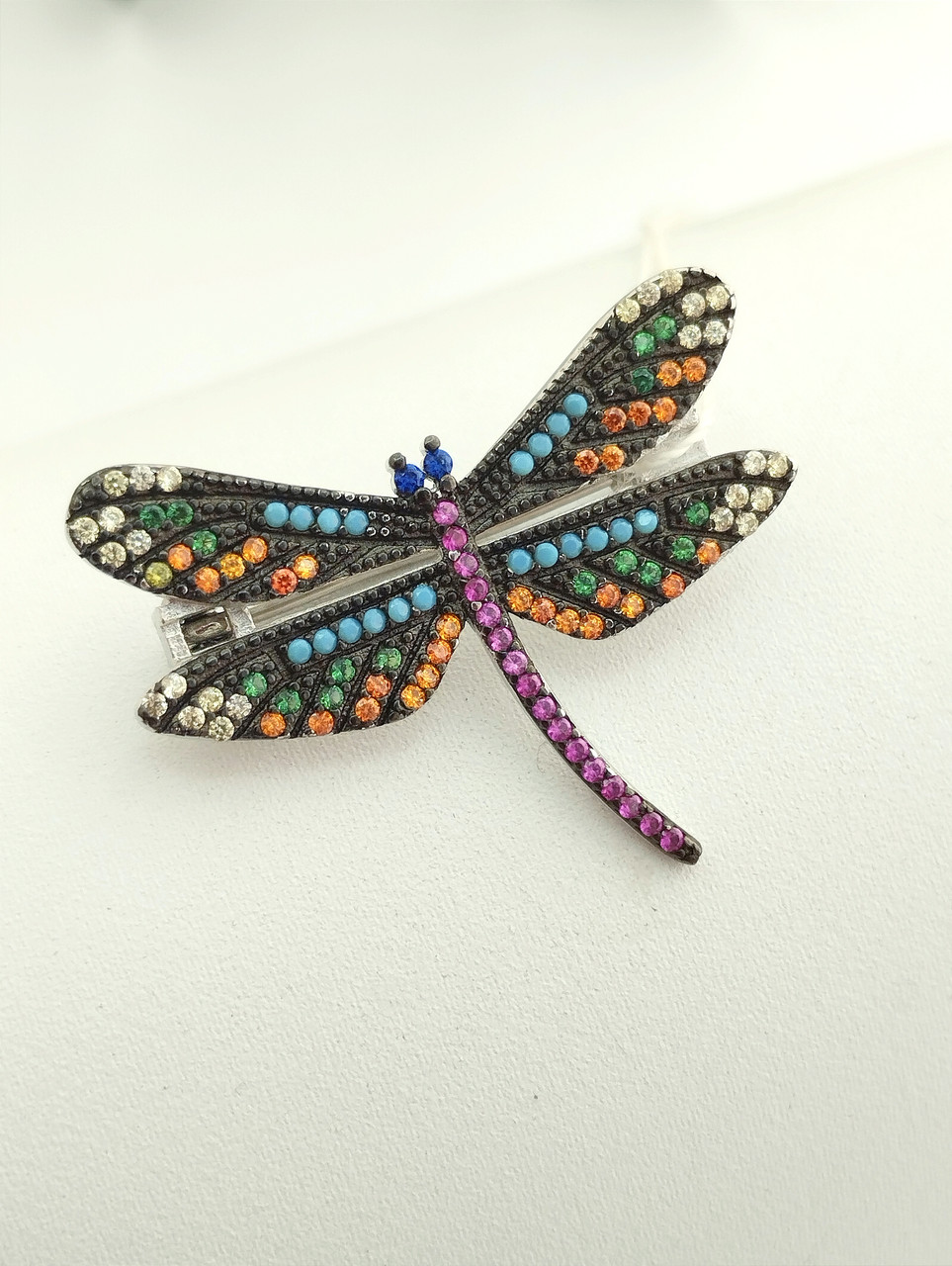 Срібна брошка