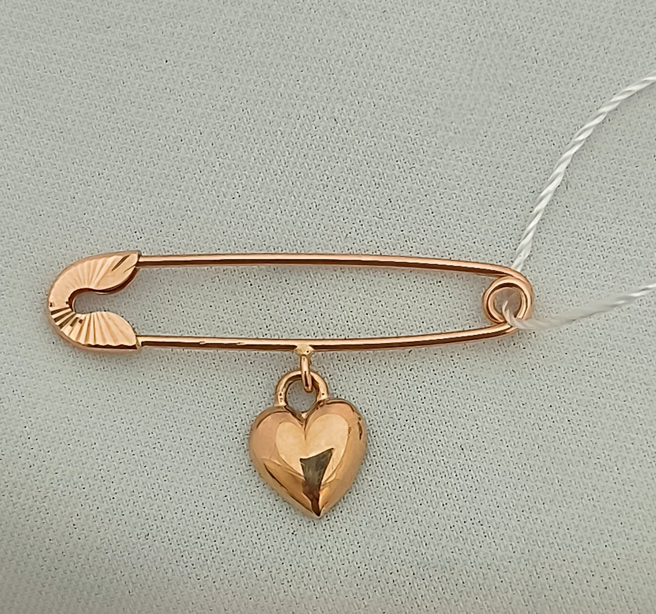 Золота шпилька