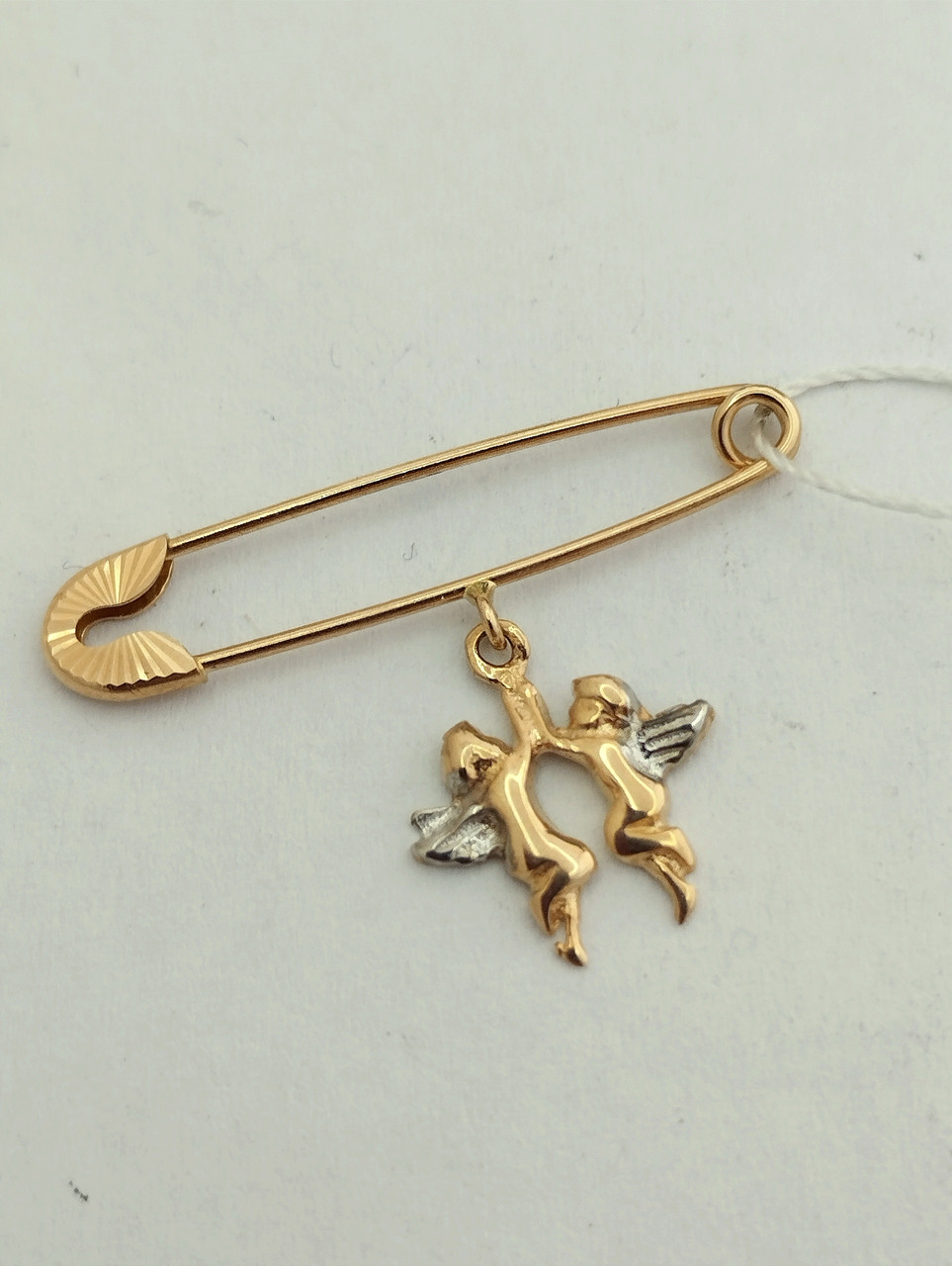 Золота шпилька